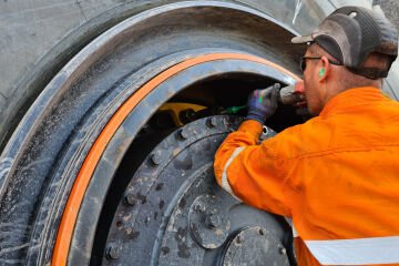 Industry first as Thiess invents manual handling solution for tyre fitters